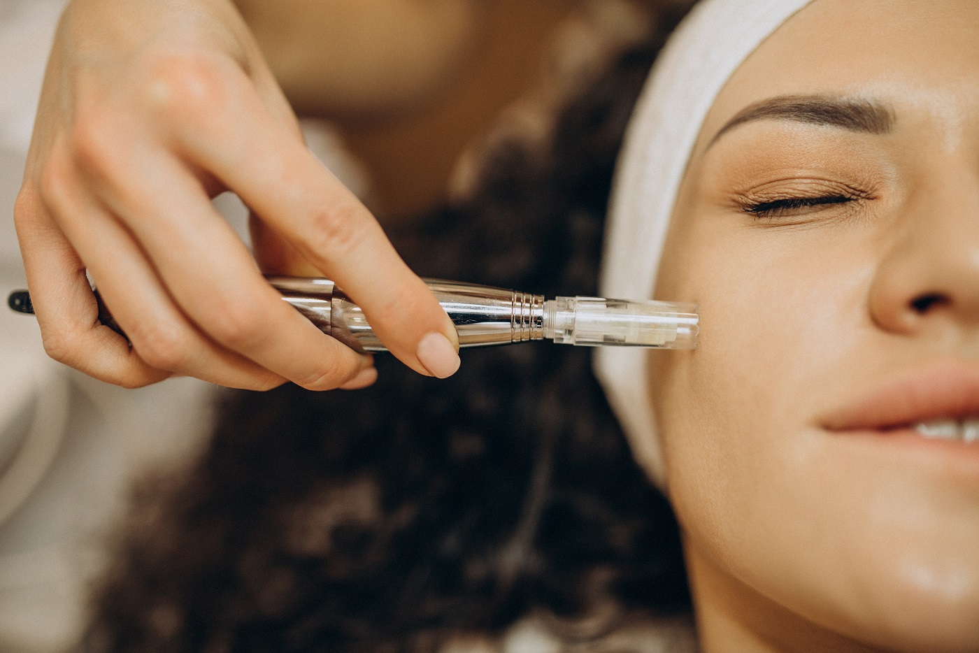 Woman at cosmetologist making beauty procedures